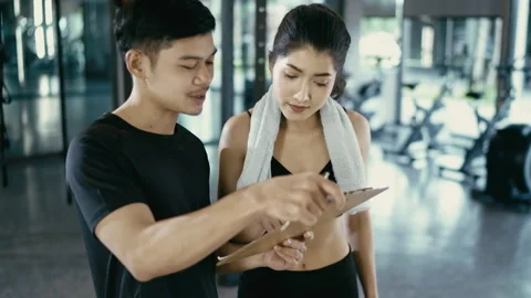 Personal trainer makes schedule of trainings. Stock Footage 150532824