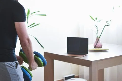 Personal trainer men using a pc for a lesson at home 스톡 사진