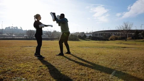 Personal trainer training boxing Stock Footage 102372492