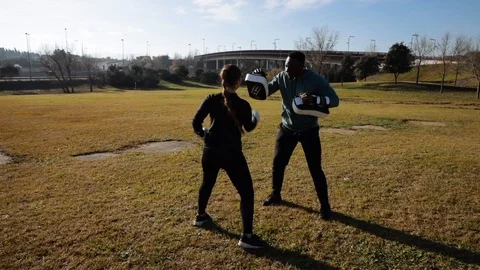 Personal trainer training boxing Stock Footage 102372509