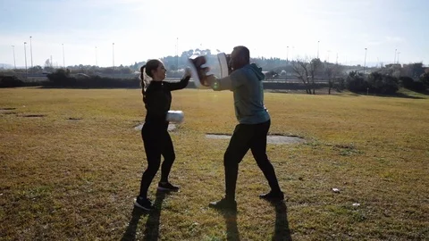 Personal trainer training boxing Stock Footage 102372521