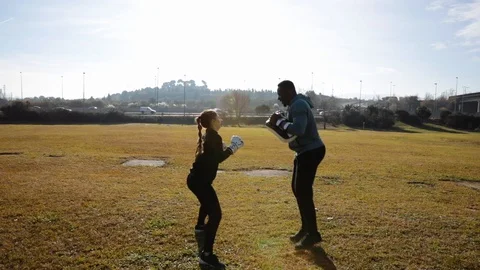 Personal trainer training boxing Stock Footage 102372553