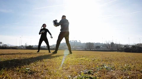 Personal trainer training boxing Stock Footage 102372560