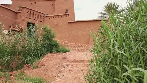 Personal view of walking in African desert scenic city close to water oasis. 動画素材 85577916