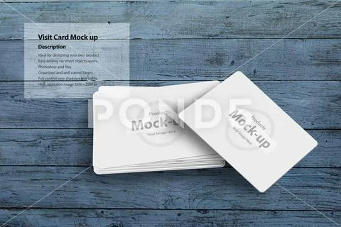 Personal visit cards on blue wood table PSD Template