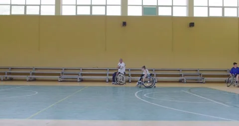 Persons with disabilities preparing for basketball match in the modern hall 스톡 동영상 167054220