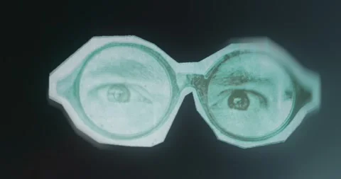 Persons eyes viewed through a large pair of glasses Stock Footage 313493978