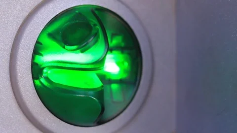 A person's hand inserts a credit card into the ATM. Close-Up video Stock Footage 82980397