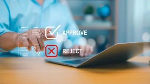 A persons hand interacts with an online document interface showing Approve .. Stock Photos