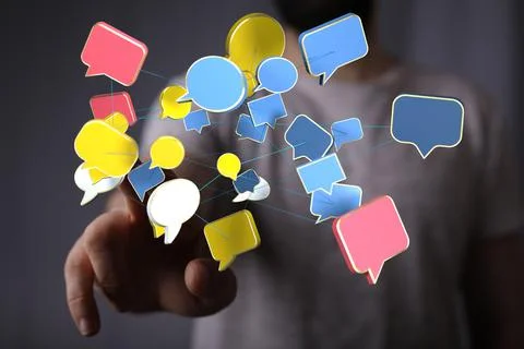 Person's hand reaching to 3D rendered speech bubble icons Stock Photos