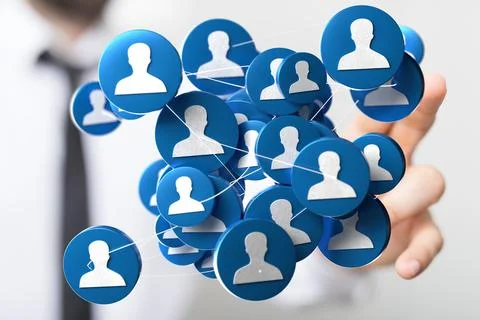 Person's hand touching 3D rendered people silhouettes in the network team Fotos de archivo