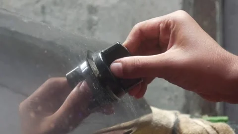 A persons hand is turning the knob of a gas stove Stock Footage 324941982