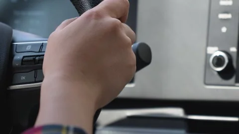 A persons hand is turning a knob on a microwave or oven Stock Footage 319826984