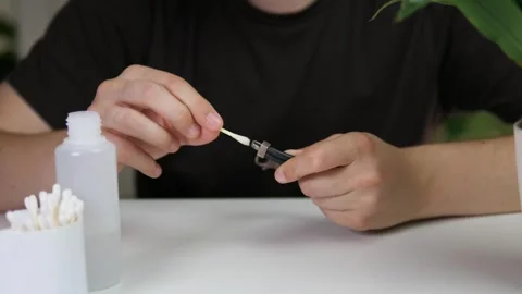 A persons hands gently restore a valued leather accessory to its original luster 스톡 동영상 315430808