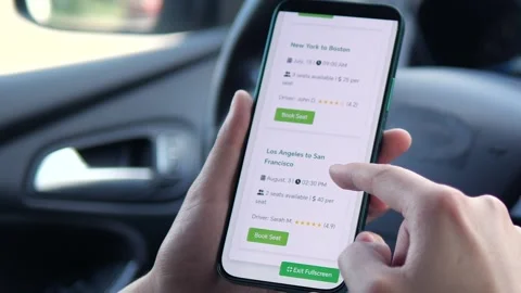 A persons hands navigate a digital platform for ride-hailing drivers, analyzing Stock Footage 315210532