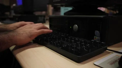 Person's Hands typing on computer keyboard Stock Footage 2725075