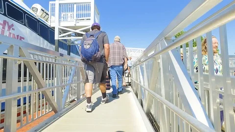 PERSONS LEAVING FERRY 2 Stock Footage 104290649