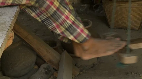 A person's leg pushing a machine Stock Footage 112684466