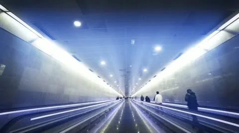 Persons moving in underground corridor Stock Footage 20489594
