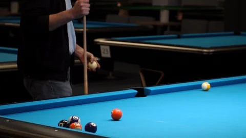 Persons play in snooker game, man plays in billiard Stock Footage 104013079