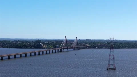 Perspective aerial view of cable-stayed San Roque González de Santa Cruz Bridge Stock Footage 328513020