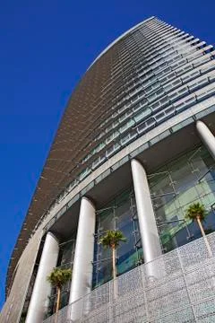 Perspective and underside angle view of modern glass building skyscrapers ove Stock Photos