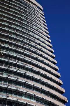 Perspective and underside angle view of modern glass building skyscrapers ove Stock Photos