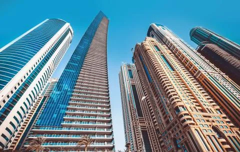 Perspective and underside angle view to textured background of modern glass blue Stock Photos