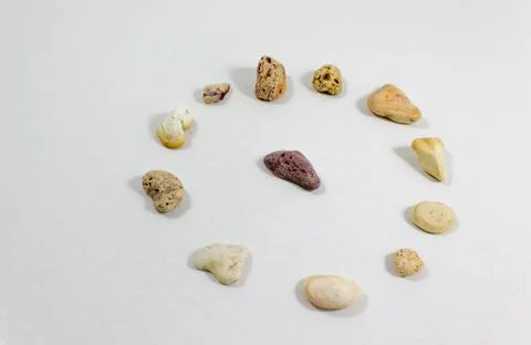 Perspective angled shot of several circular positioned colorful stones that c Foto stock
