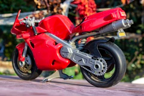 Perspective back shoot of red small kid toy bike Stock Photos