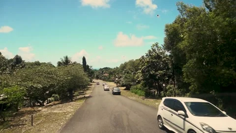 Perspective from a car driving through a village in Yogyakarta, Indonesia. Stock Footage 325440976