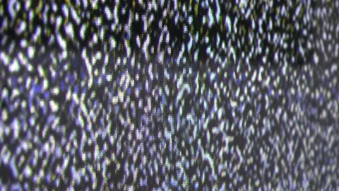 Perspective close up view at a plasma tv while showing television activity. Stock Footage 164335146