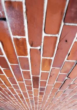 Perspective closeup of a red brick wall, copy space on home exterior, house or 写真素材