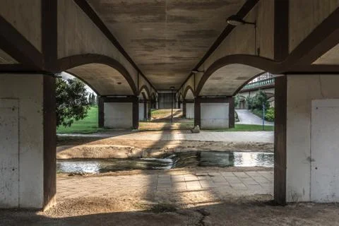 Perspective construction from under the bridge. Stock Photos