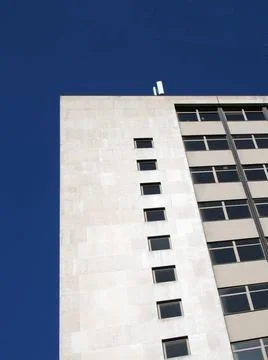  perspective corner view of an old white 1960s concrete office block again... Stock Photos