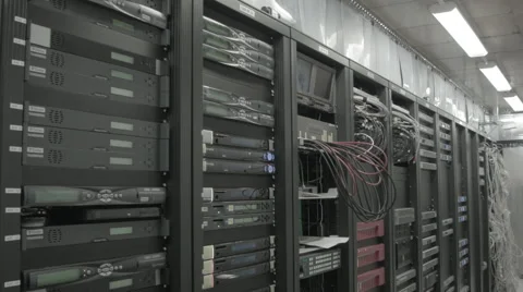 Perspective downtilt over wall of racks with interfaces Video stock 57749292