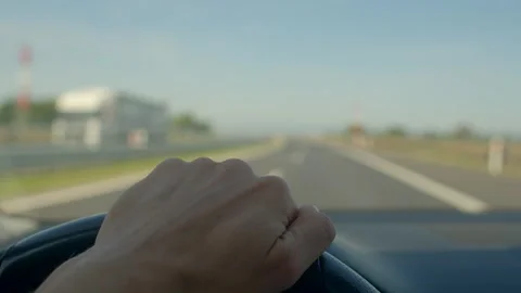 Perspective of driver maneuvering swiftly around passing truck on highway 库存影片 334117567