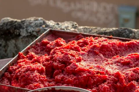 Perspective handmade tomato paste producing process at sunset time Stock Photos