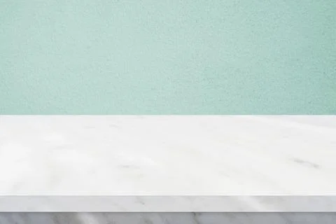 Perspective marble table surface and green wall background, Grey and white ma Stock Photos