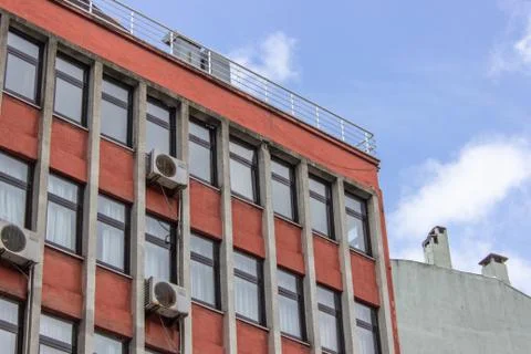 Perspective multi storey building orange colored facade at Ankara in central  Stock Photos
