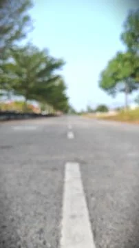 Perspective Road with White Dashed Line Background Stock Photos