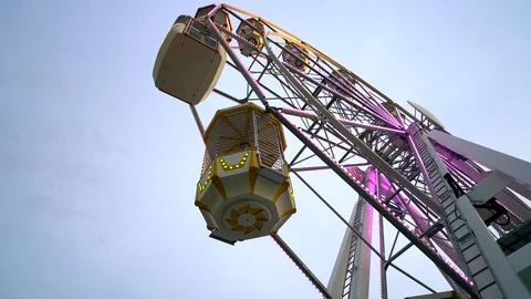 Perspective shot of ferris wheel cabins Video stock 106017734