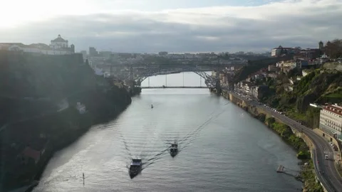 Perspective shot of the river banks and moving boats from above. Stock Footage 327624727