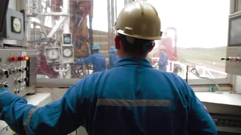 Perspective Shot of two oil and gas Workers Stock Footage 45236610