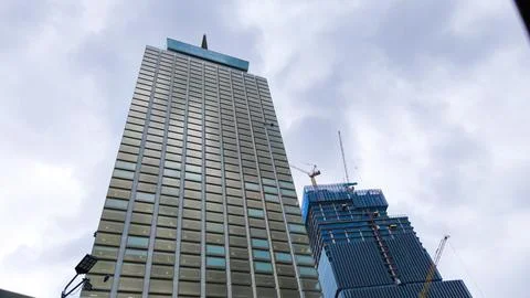 Perspective, the skyscraper is directed to the sky. blue gradient, light re.. Stock Photos
