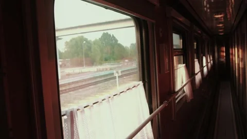 Perspective from A train corridor looking out at A passing station. Another Stock Footage 322095141