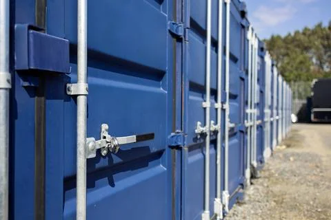 Perspective View of Blue Storage Containers in Industrial Yard Stock Photos