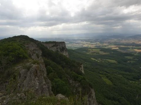 Perspective view on a cliff with plain in background with light and shadow ef Stock Photos