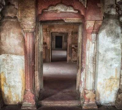 Perspective view of columns and doorways of ancient temple in India Stock Photos