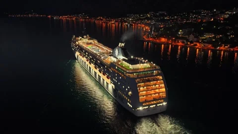 Perspective view of cruise ship and mountain silhouettes Stock Footage 330646919